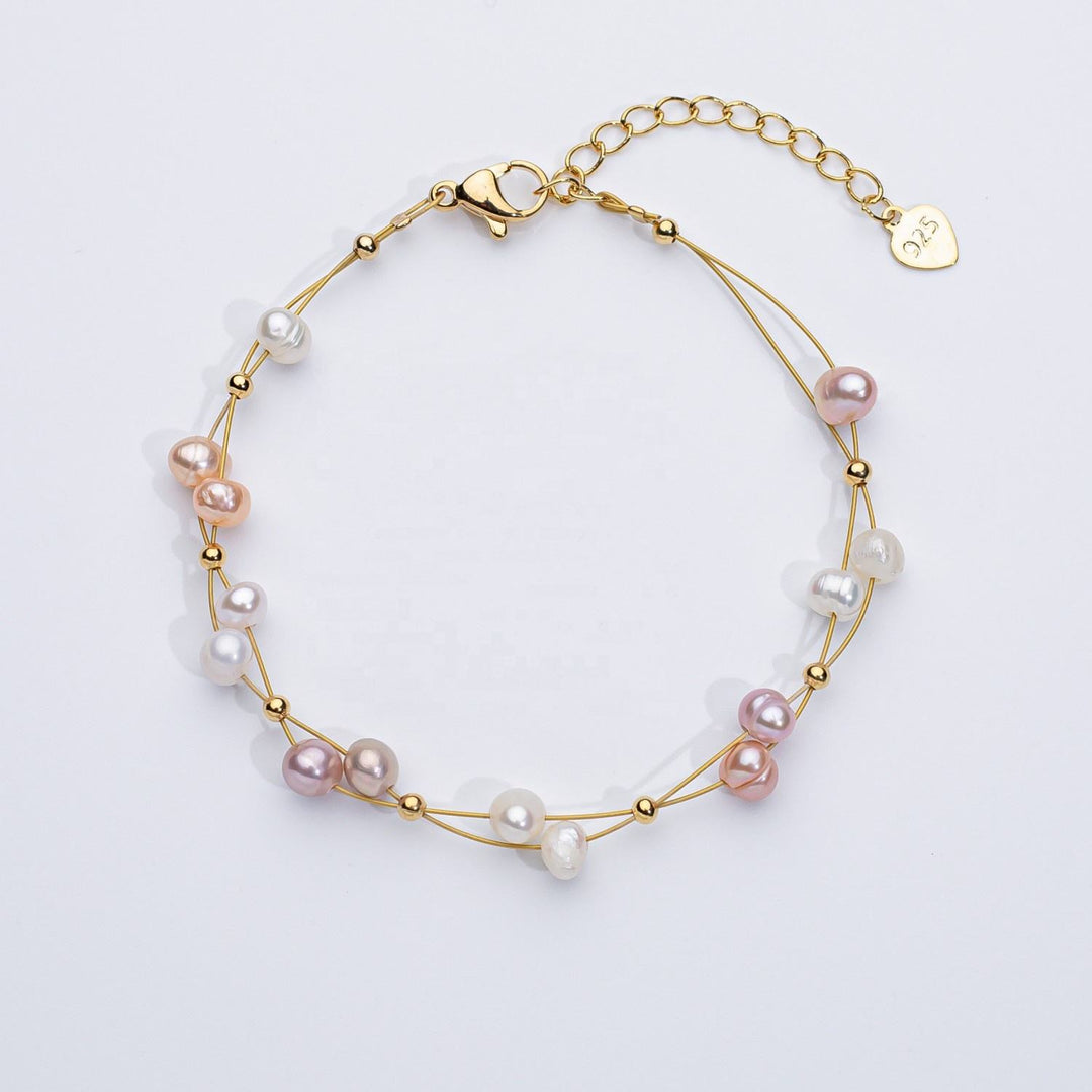 Marlene – Bracciale dorato con singoli accenti di perle