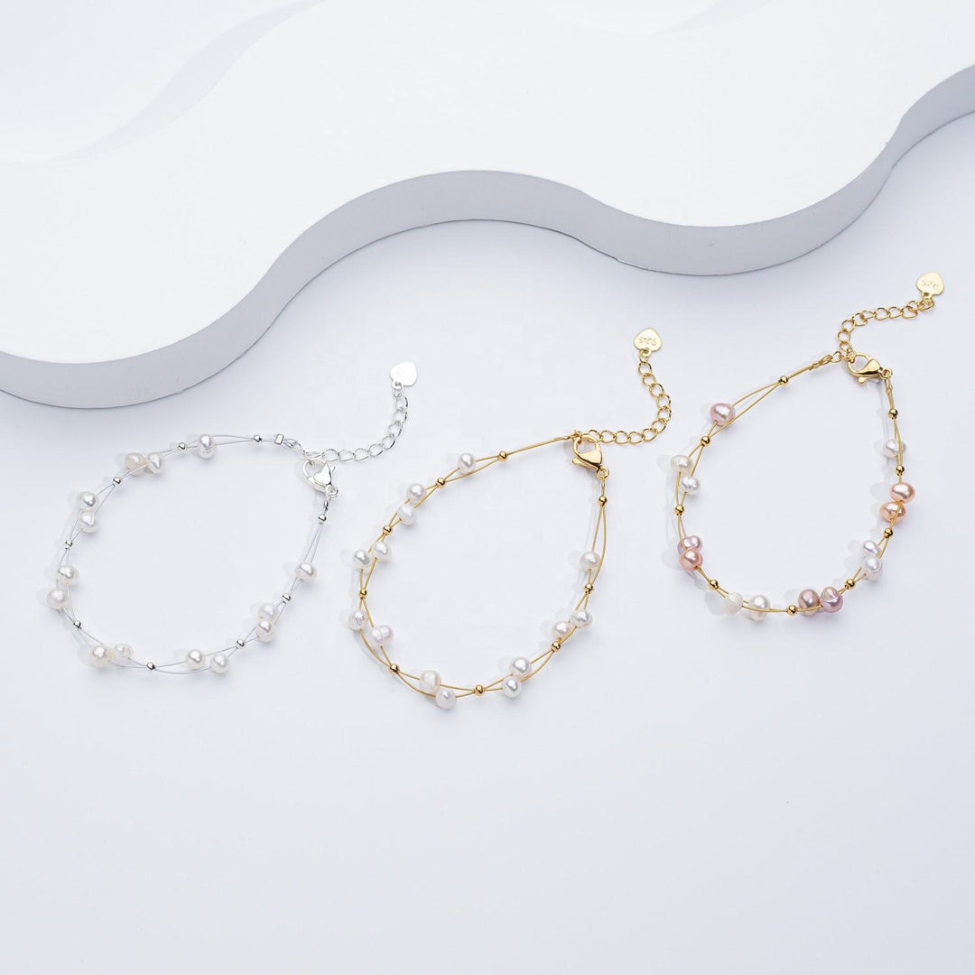 Marlene – Bracciale dorato con singoli accenti di perle