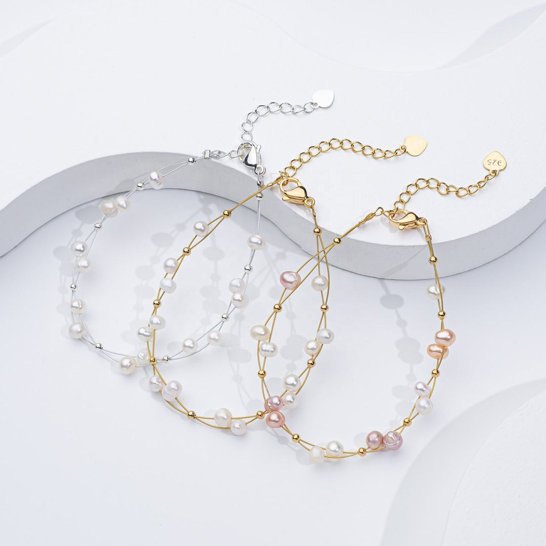 Marlene – Bracciale dorato con singoli accenti di perle