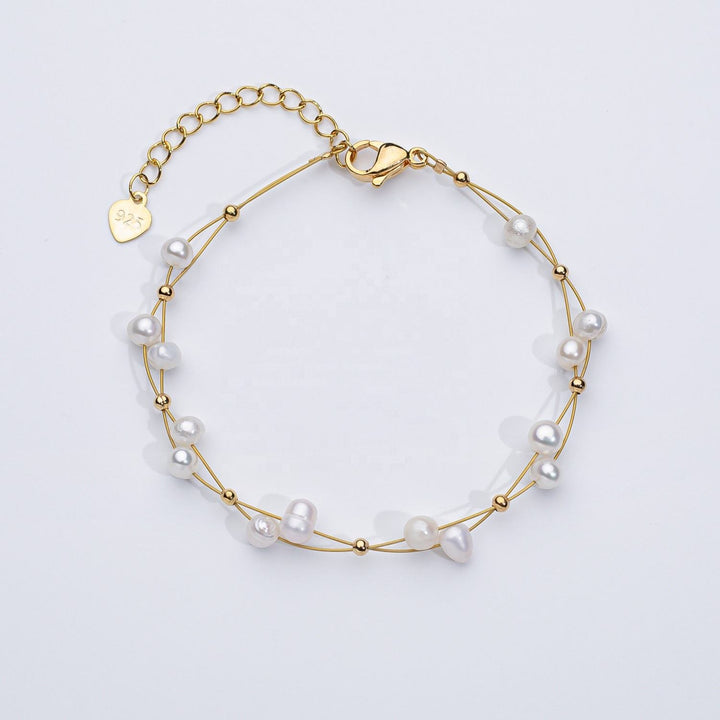 Marlene – Bracciale dorato con singoli accenti di perle