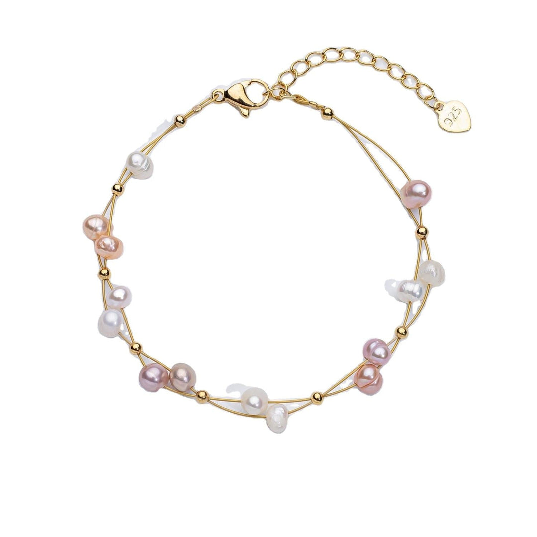 Marlene – Bracciale dorato con singoli accenti di perle