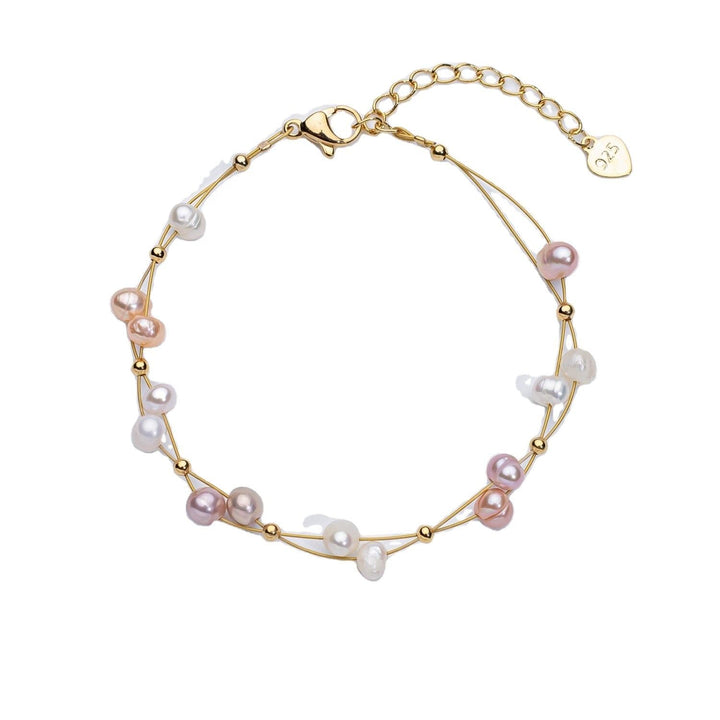 Marlene – Bracciale dorato con singoli accenti di perle