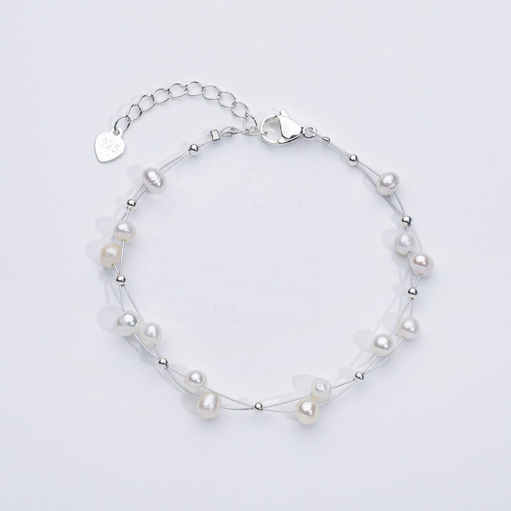 Marlene – Bracciale dorato con singoli accenti di perle