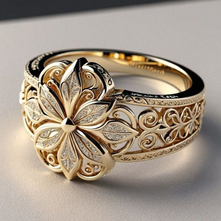 Daniela – Anello in oro con motivo floreale esotico in zircone