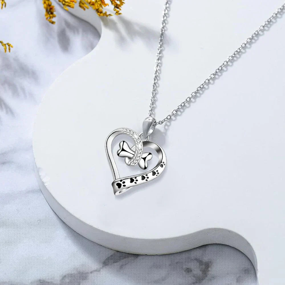 Set di gioielli in 2 pezzi con pendenti a forma di zampa, cuore e osso
