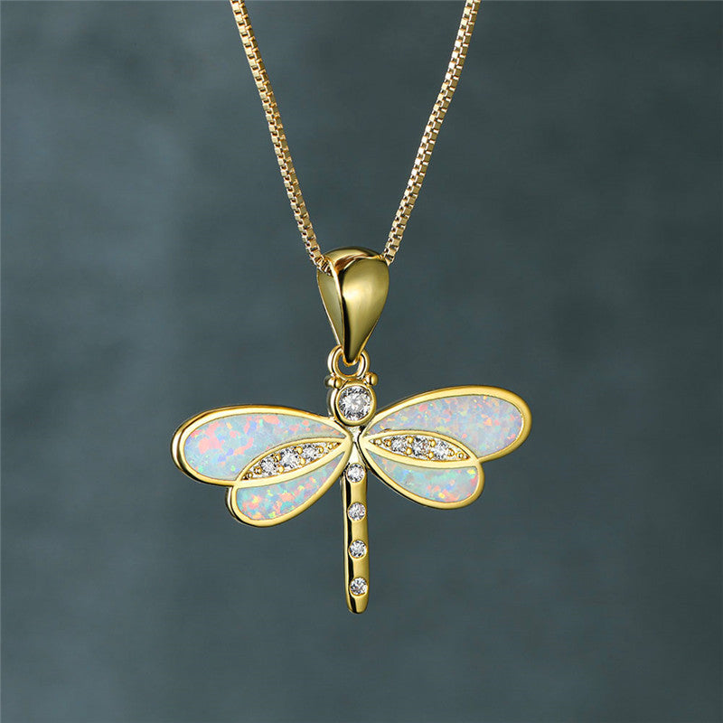 Collier dorato a farfalla con opale