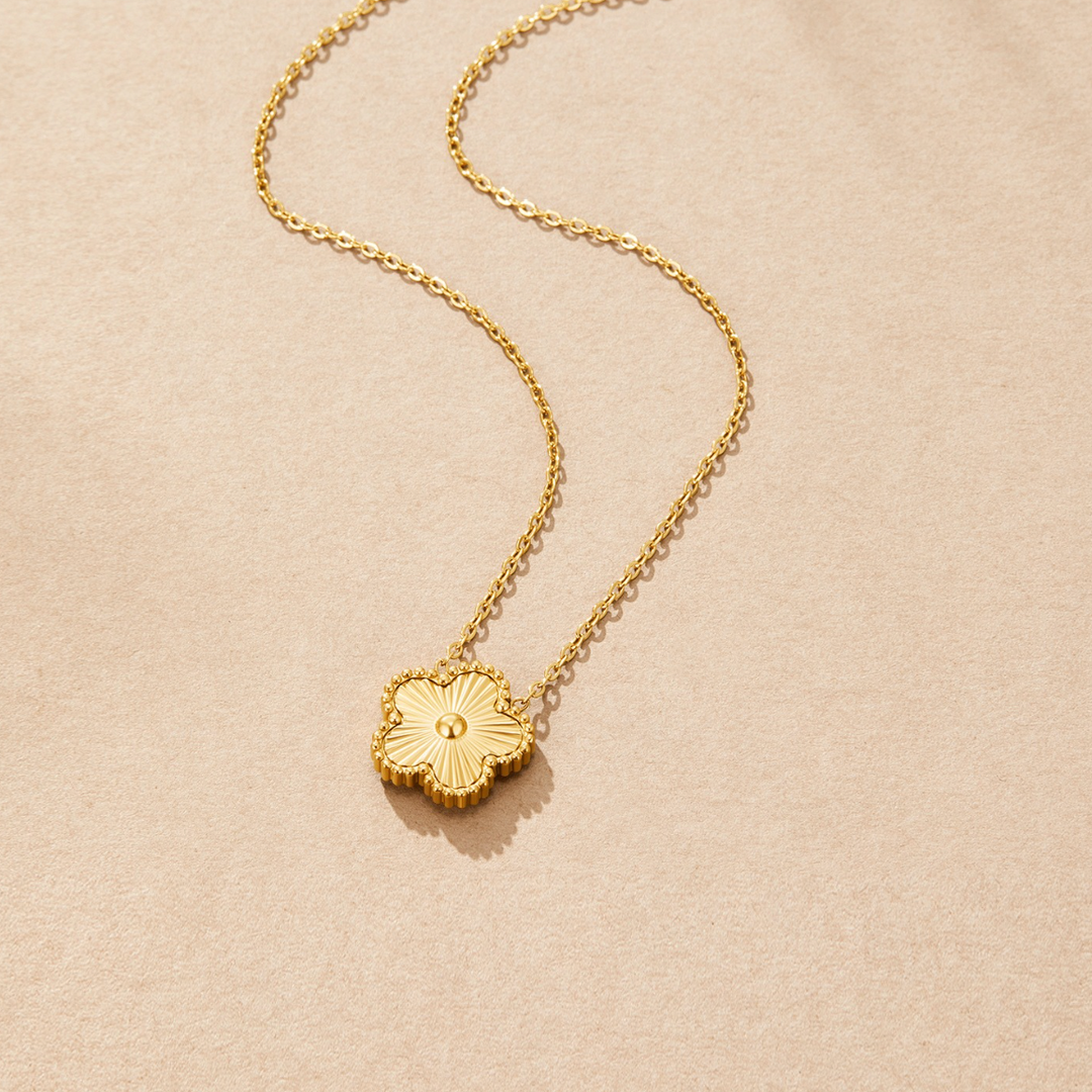 Collier dorato della fortuna