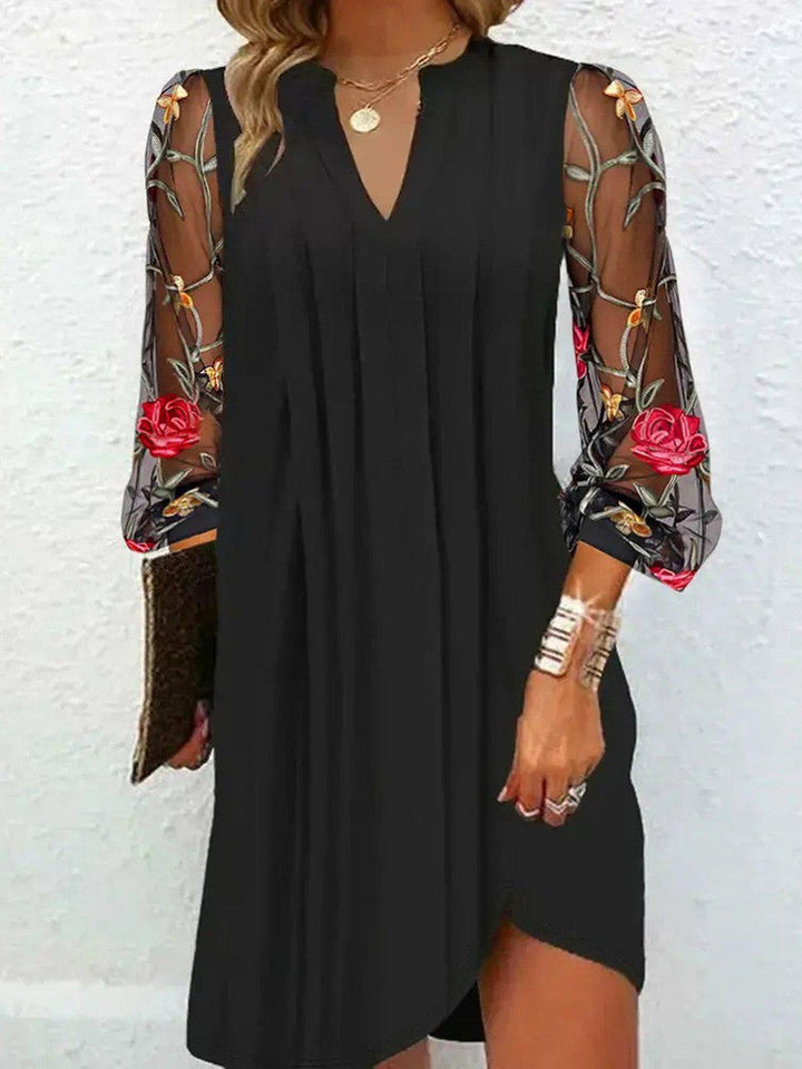 Anne™ | Elegant mini dress with V-neckline and sheer sleeves