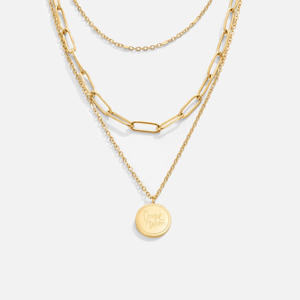 Lea – Una delicata collana multipla dorata con linee eleganti cadenti