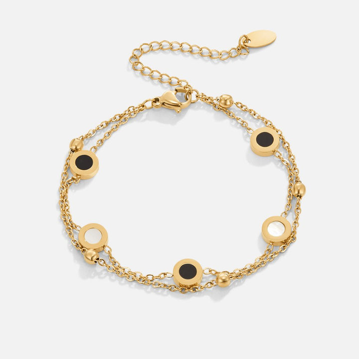 Carla – Bracciale delicato dorato con elementi rotondi a contrasto