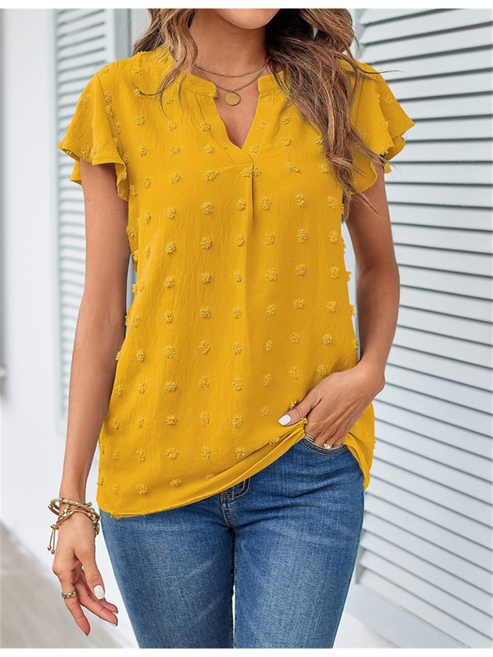 Leila | Chic Patchwork Blouse with Ruffled Accents