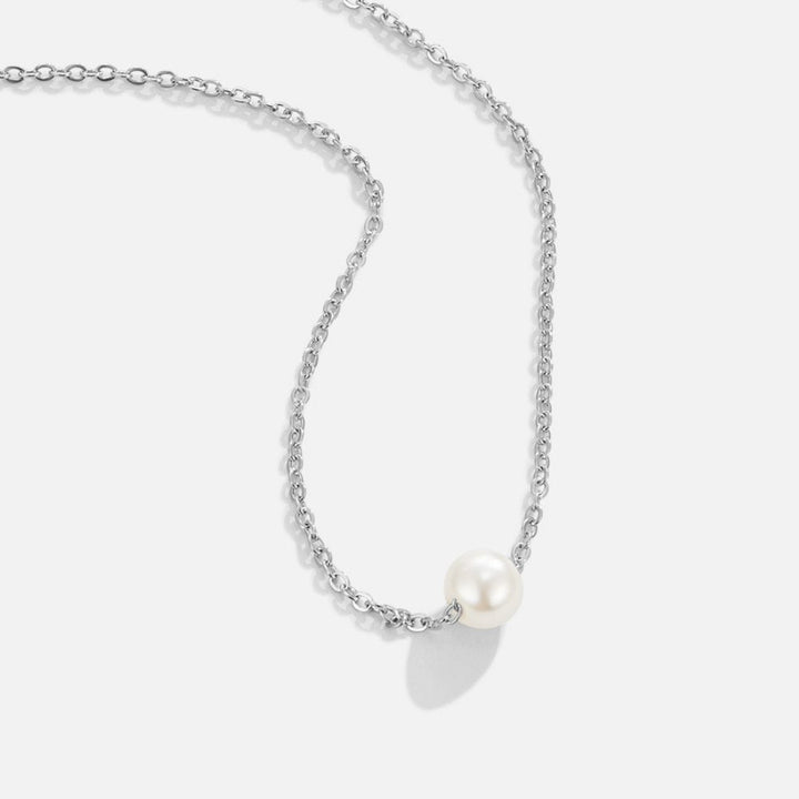 Clara – Collana dorata con pendente rotondo