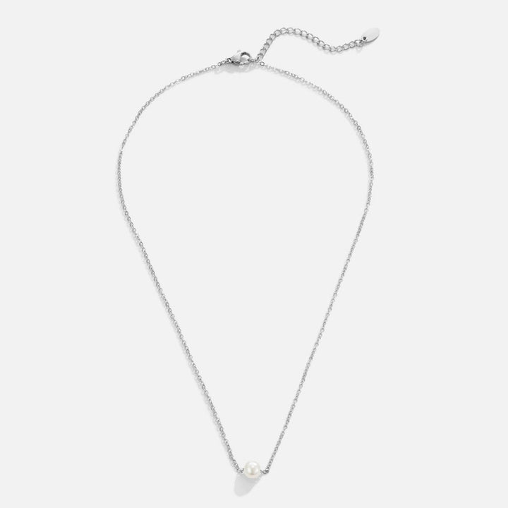 Clara – Collana dorata con pendente rotondo