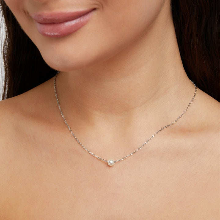 Clara – Collana dorata con pendente rotondo